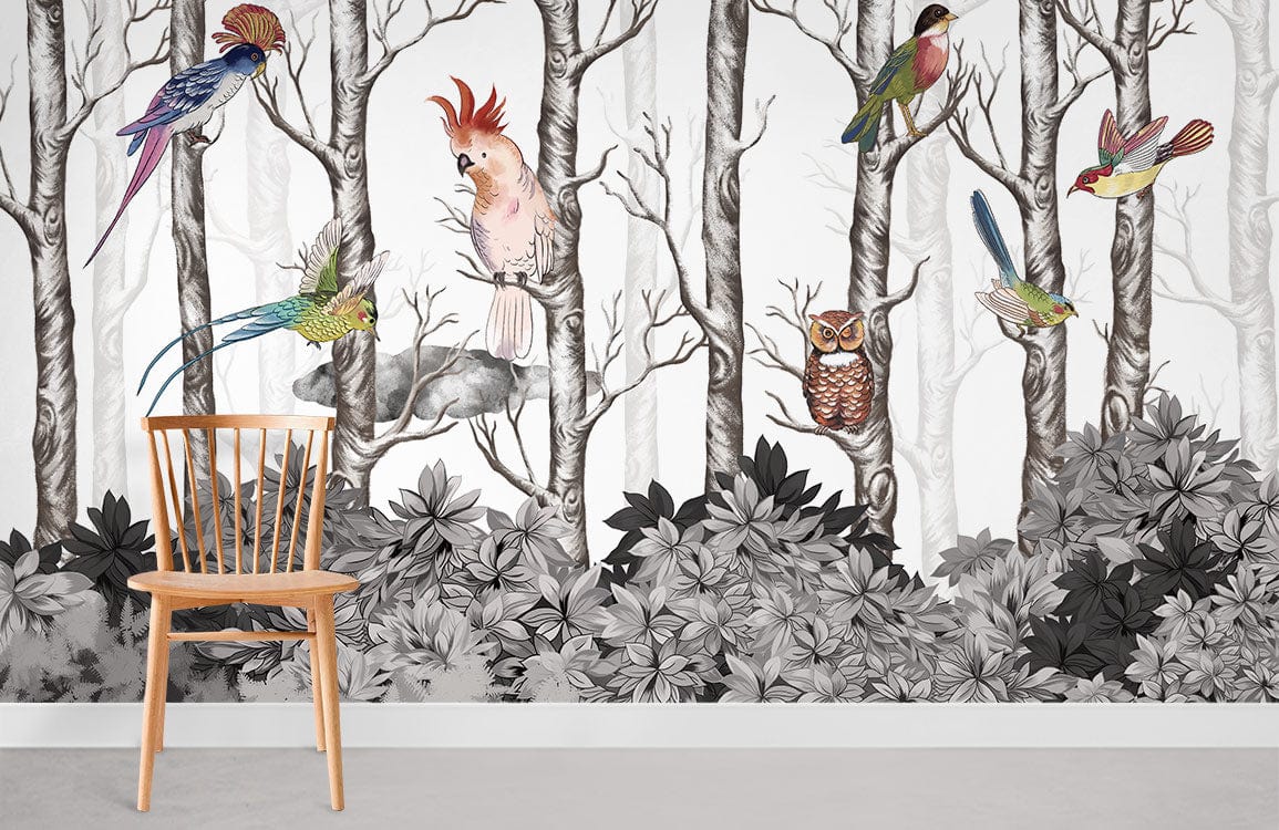 Colourful Bird Woodland Oasis mural wallpaper featuring elegant forest creatures and wooden chair on grey flooring.