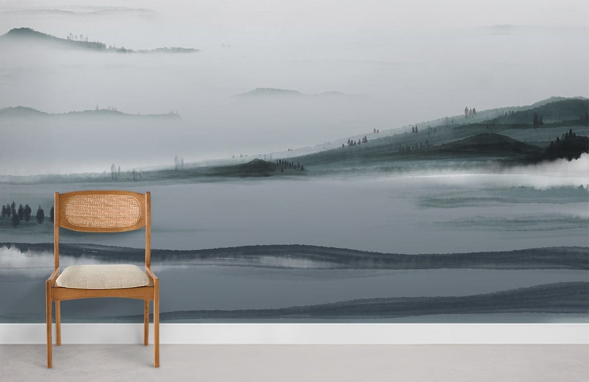 Serene Misty Landscape Mural Wallpaper in blue-green watercolour with wooden chair on neutral flooring.