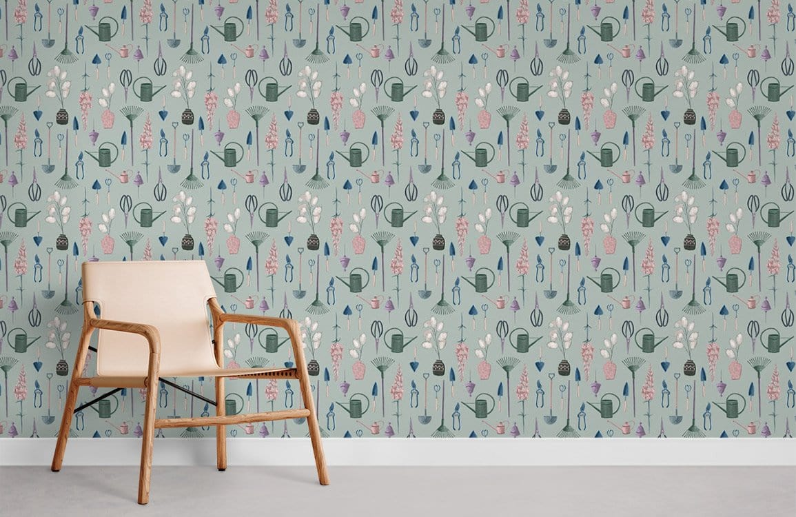 Whimsical pastel garden wallpaper in soft teal with watering can pattern, wooden chair, grey flooring.