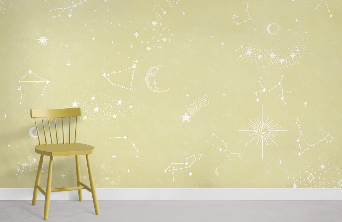 Yellow constellation wallpaper by Celestial Dreams; beige cosmos pattern, modern chair, grey flooring.